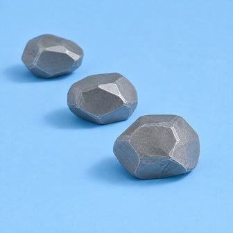 Grey mineral stones on a sky ground