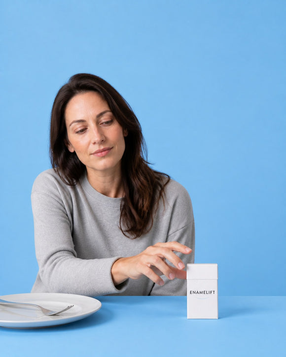 Woman reaching for an ENAMELIFT pack after a meal